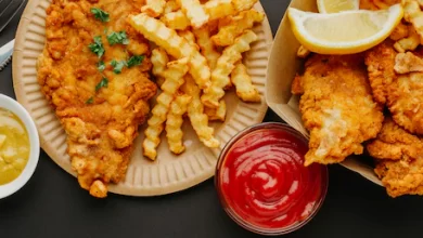 top view fish chips with selection sauces cutlery 23 2148784861