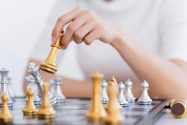 business strategy ideas concept hand play chess board 609648 1912