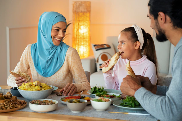 smiley family eating together medium shot 23 2149636054